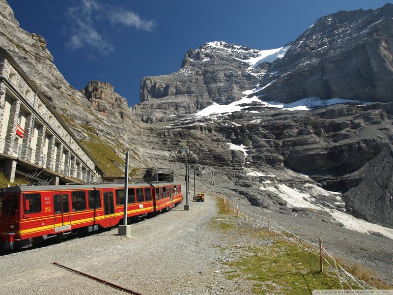 Red Train in Mountain Valley — Dramatic