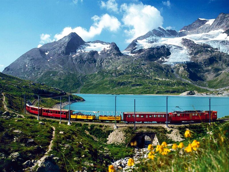 Red Train in Mountains