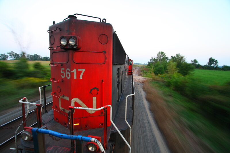 Red train moving on tracks