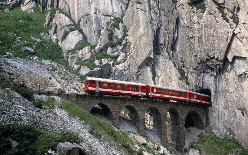 Red Train on Bridge — Dramatic