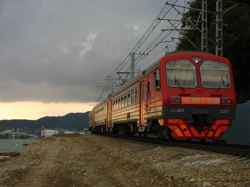 Red Train on Tracks — Dramatic, Sunset