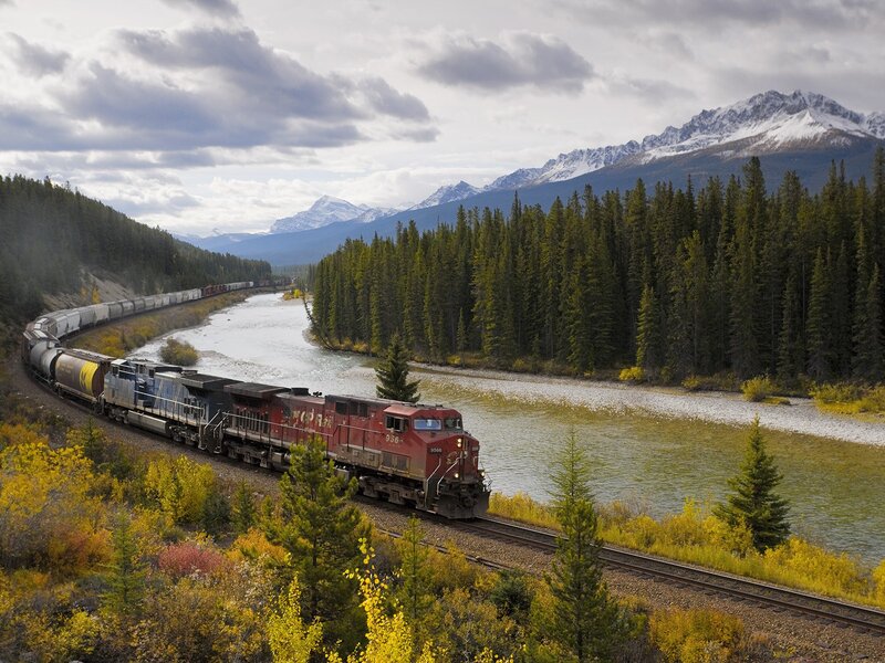 Red Train on Tracks — Green, Serene