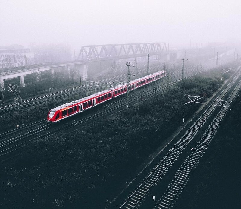Red Train on Tracks — Misty