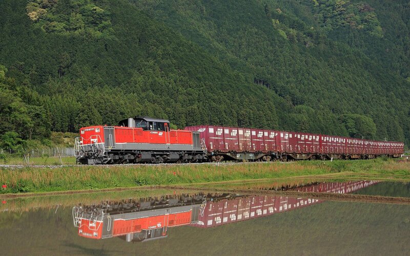 Red Train on Tracks — Serene, Afternoon