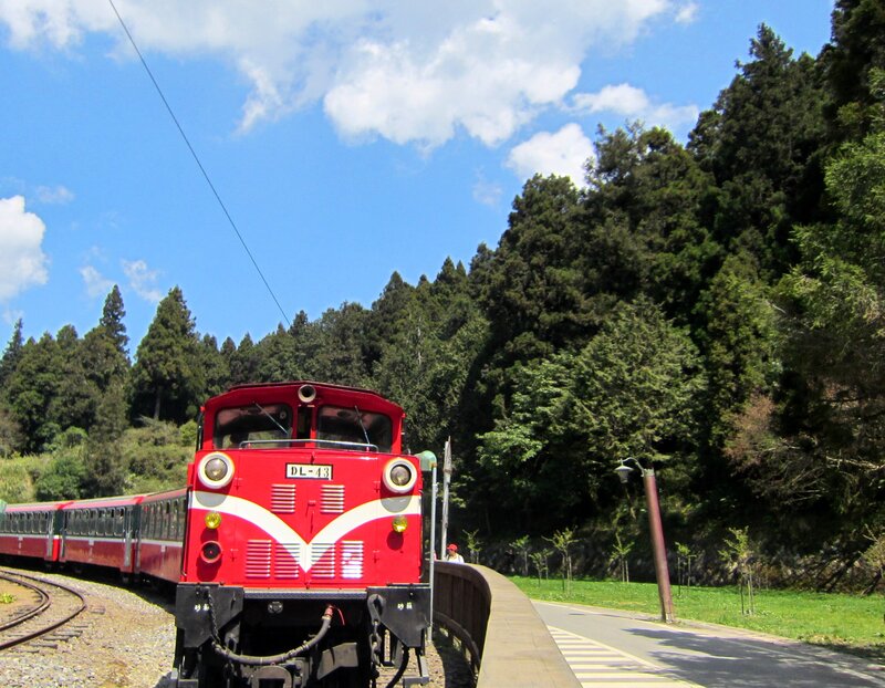 Red Train on Tracks — Serene