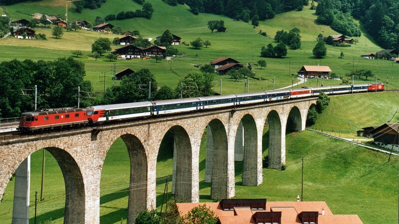 Red Train on Viaduct — Green