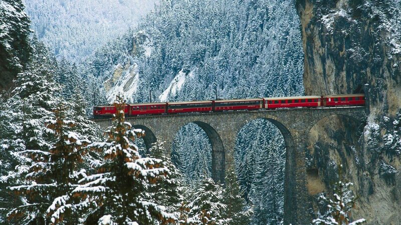 Red Train on Viaduct — Serene, Winter, Photograph, Snowy Forest