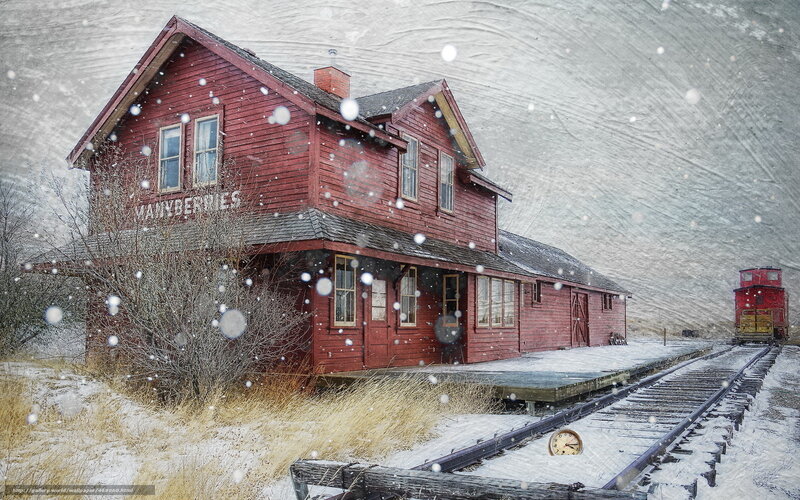 Red train station in snow