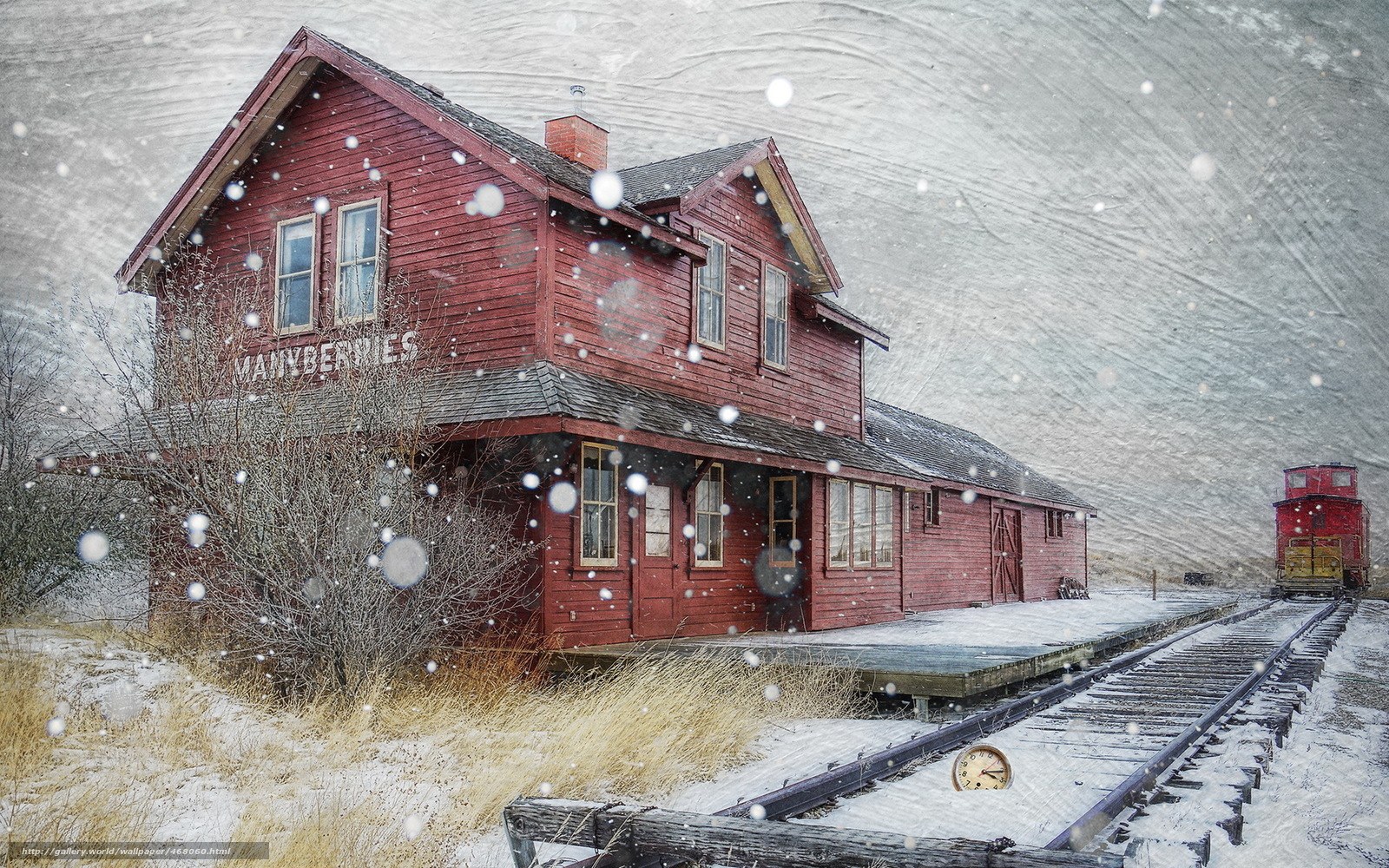 Red train station in snow