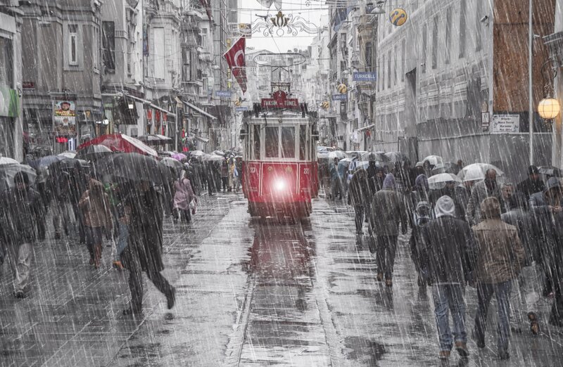 Red Tram in Rain — Dramatic