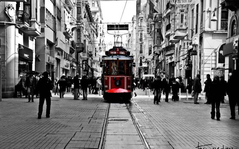 Red Tram on Street — Black