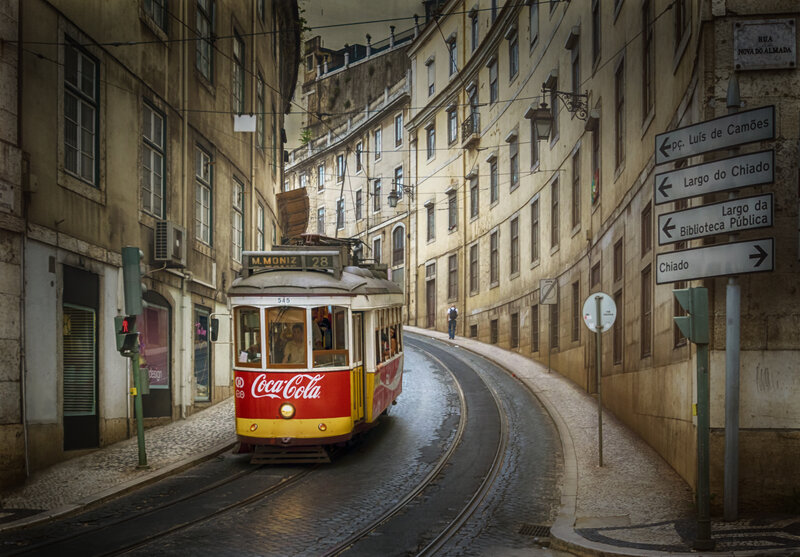 Red Tram on Street — Dramatic, Afternoon