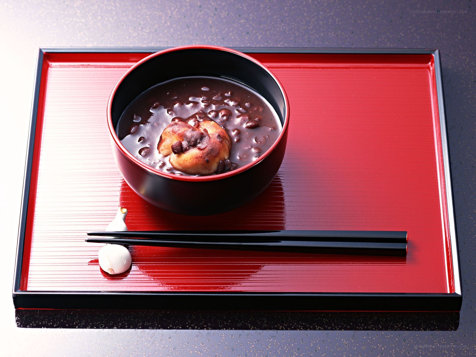Red tray with sweet soup