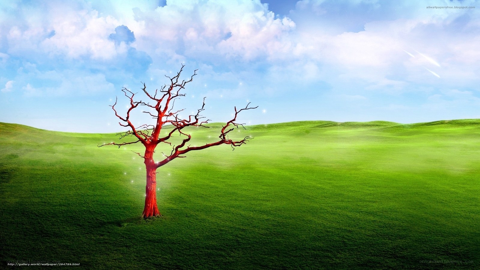 Red tree in green field