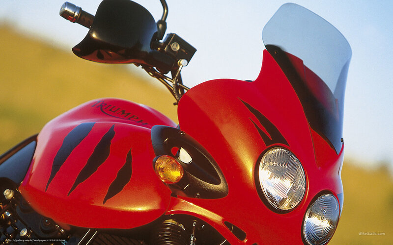 Red Triumph motorcycle front view