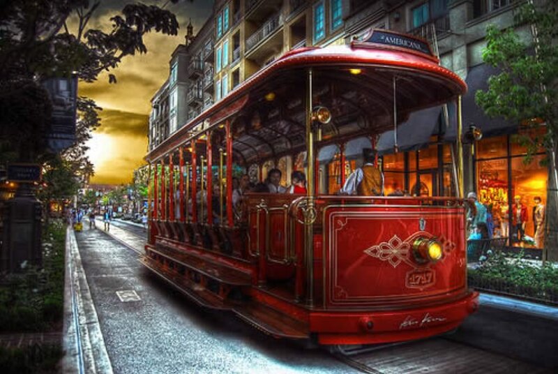 Red trolley in city street