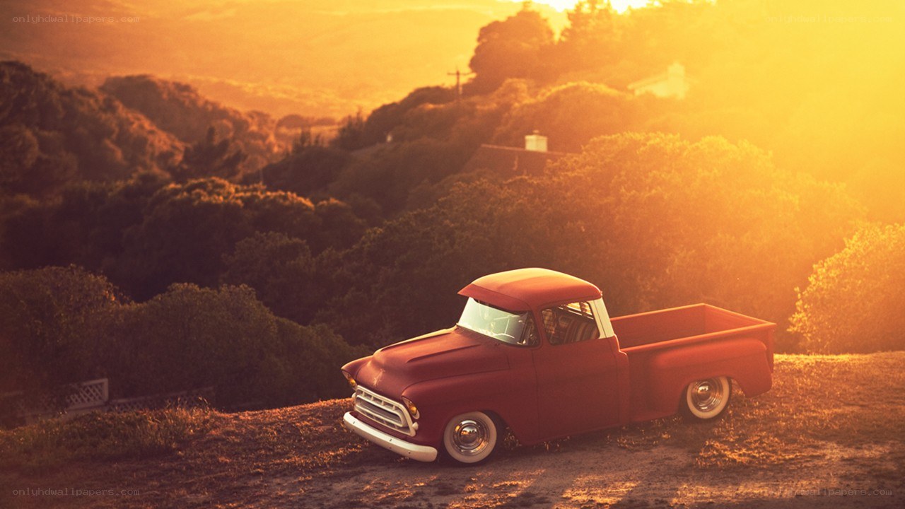 Red truck at sunset