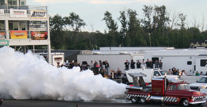 Red Truck Emitting Smoke