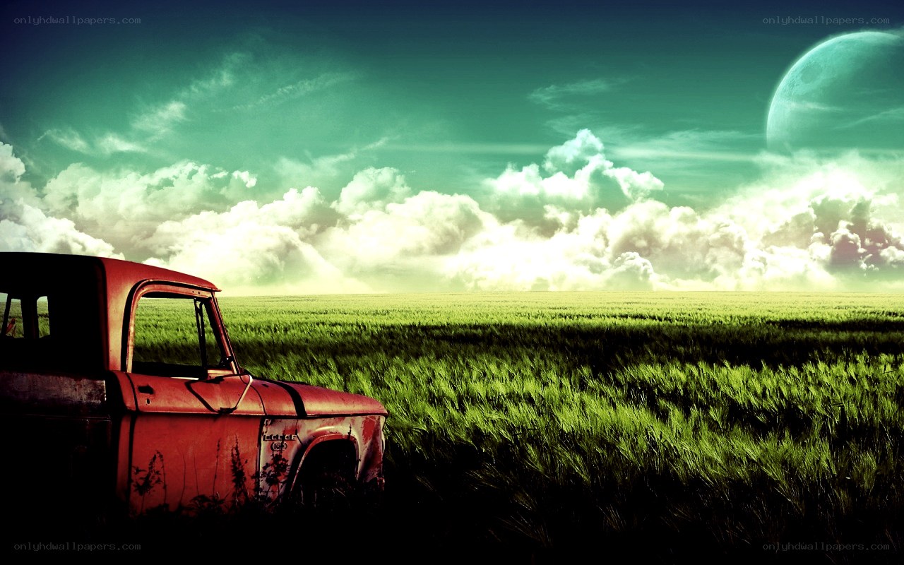 Red truck in green field