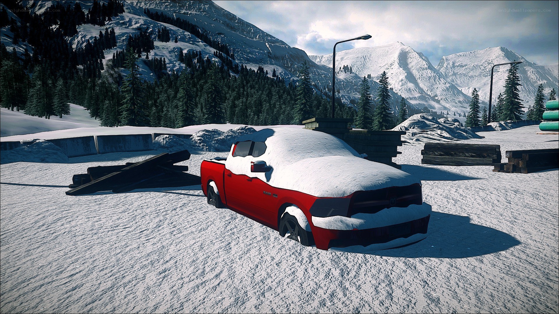 Red truck in snowy mountains
