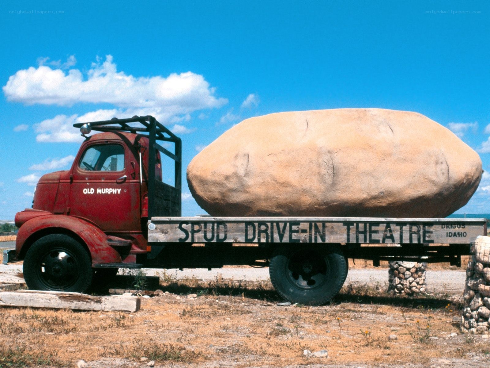 Red truck with giant potato