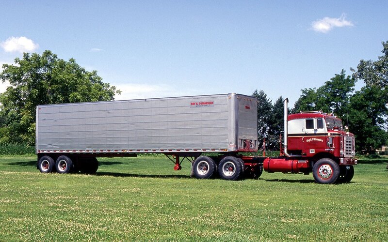 Red truck with silver trailer