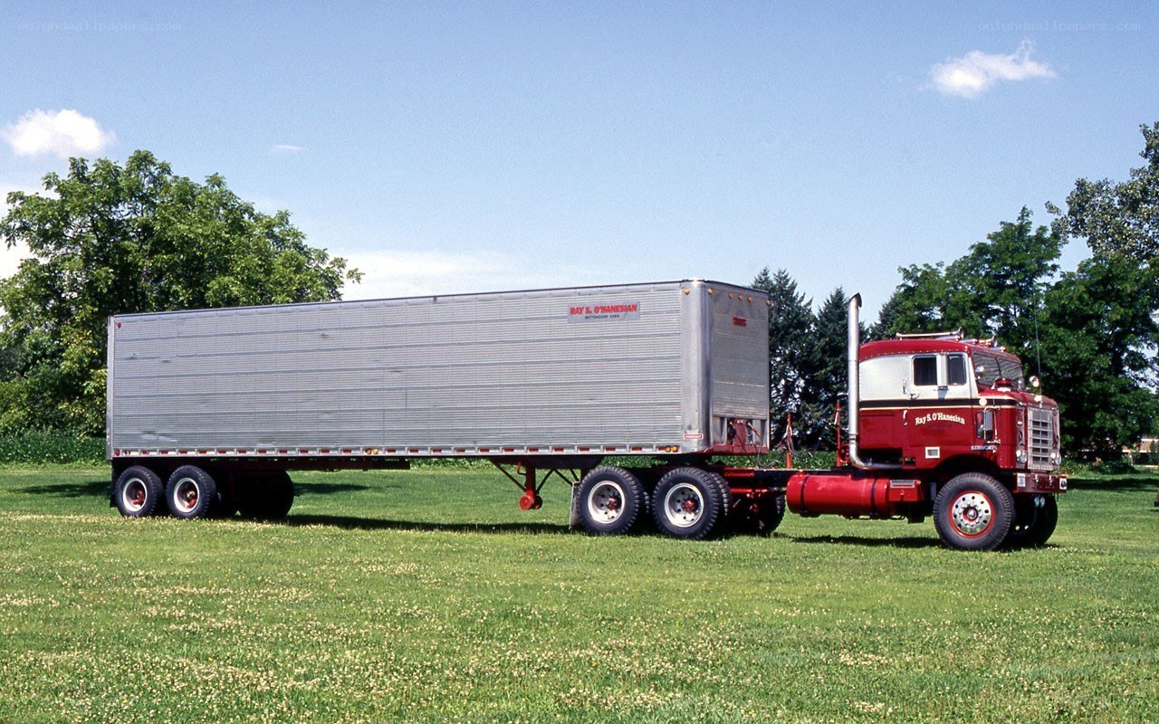 Red truck with silver trailer