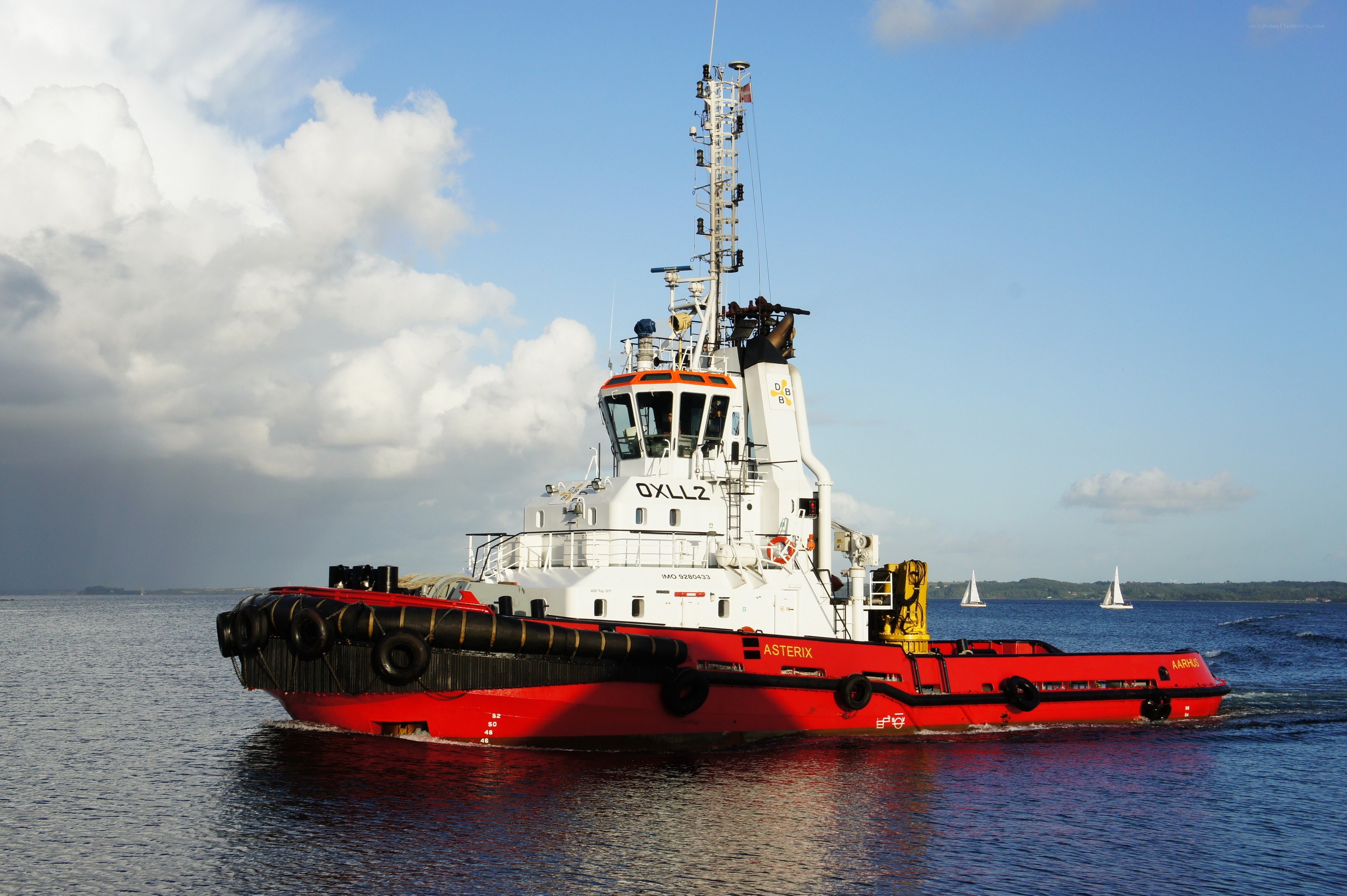 Red tugboat on the water