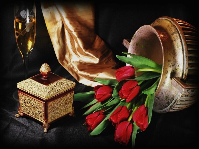 Red tulips and ornate box