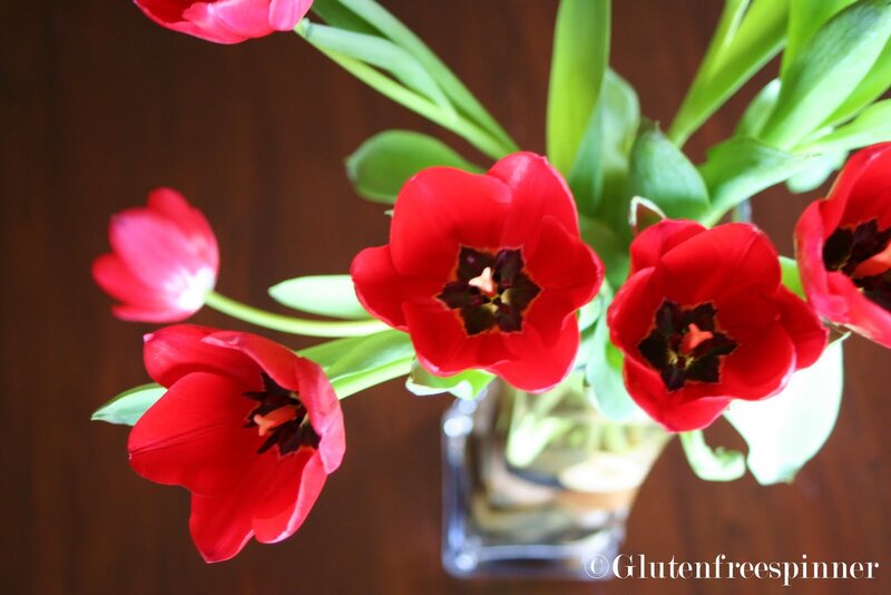 Red Tulips in Vase — Calm, Photograph, Green Leaves
