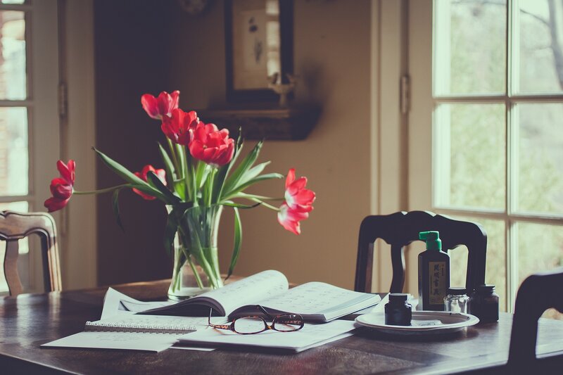 Red Tulips on Table — Serene, Morning