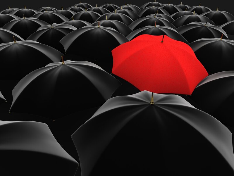 Red Umbrella Among Black