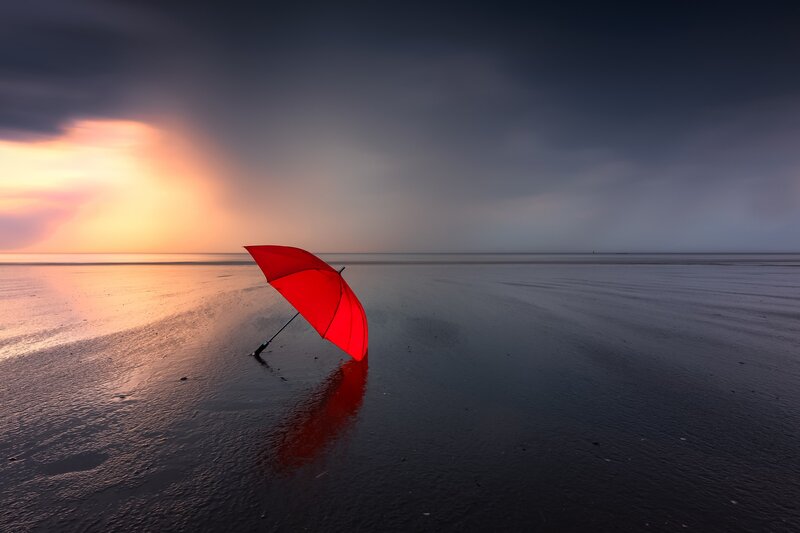 Red Umbrella on Beach — Dramatic, Sunset, Photograph, Sky