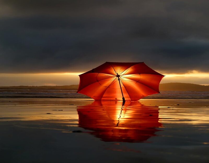 Red Umbrella on Beach — Dramatic