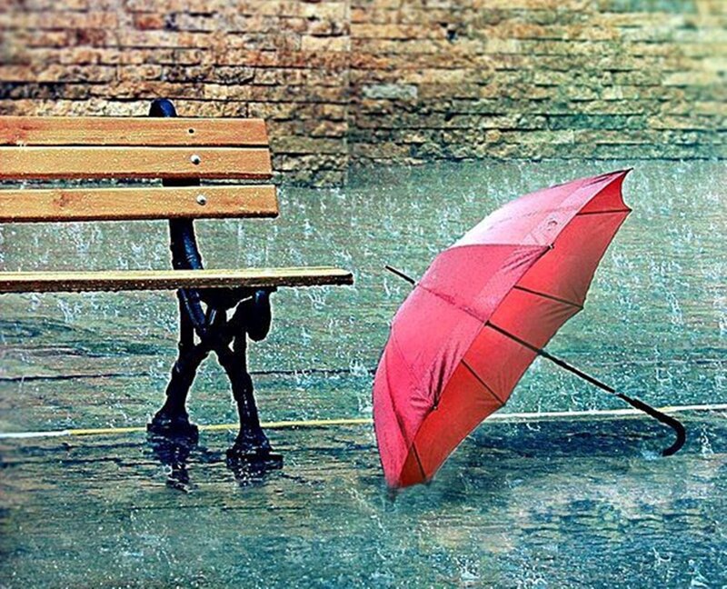 Red Umbrella on Bench