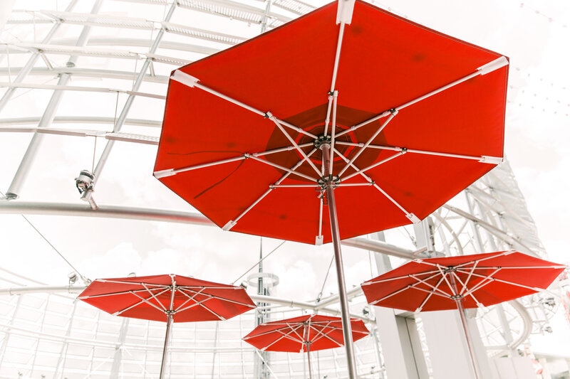 Red Umbrellas in Structure