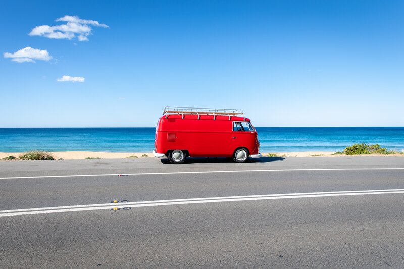 Red Van on Coastal Road