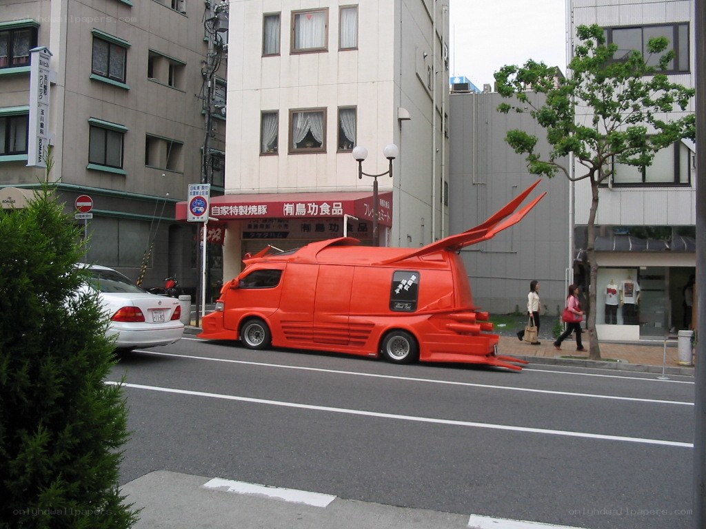 Red van shaped like a bird