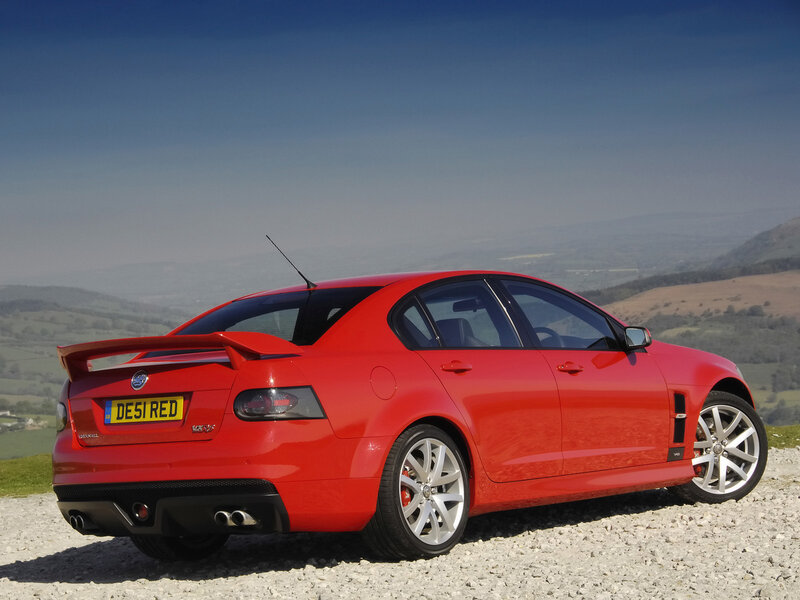 Red Vauxhall Monaro on a hill