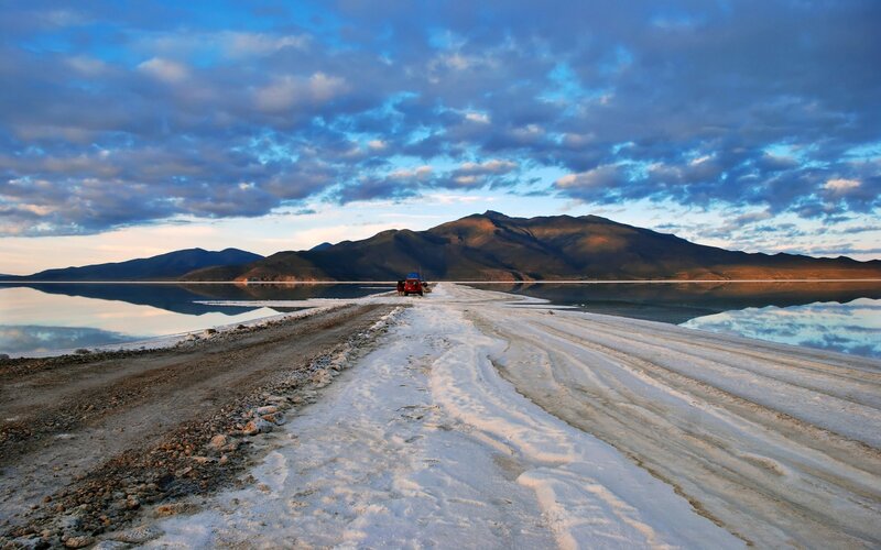 Red Vehicle on Salt Flat