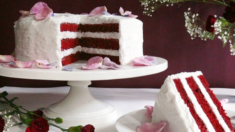Red velvet cake with rose petals