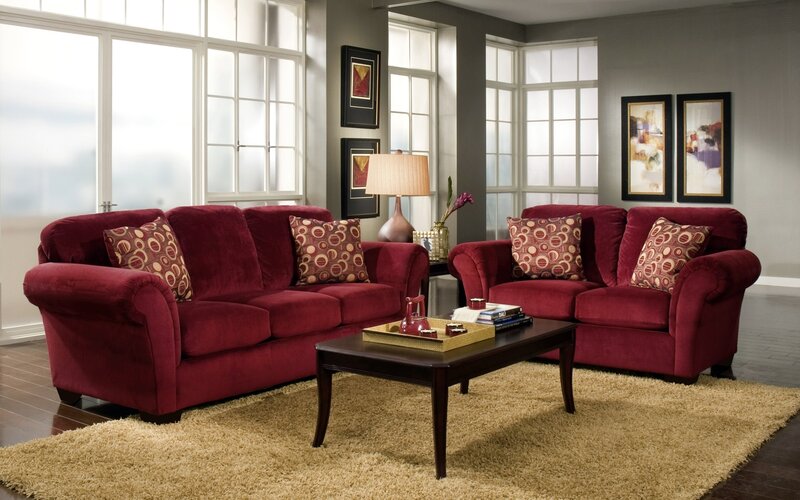 Red velvet sofa set in living room