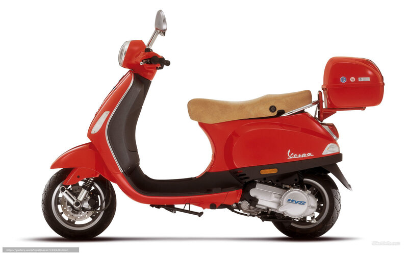 Red Vespa scooter with storage