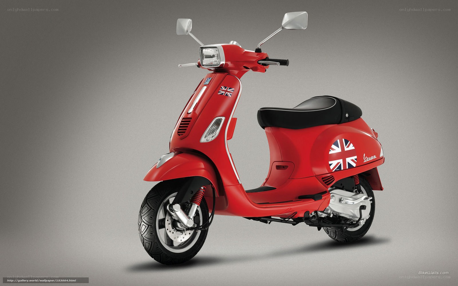 Red Vespa scooter with Union Jack