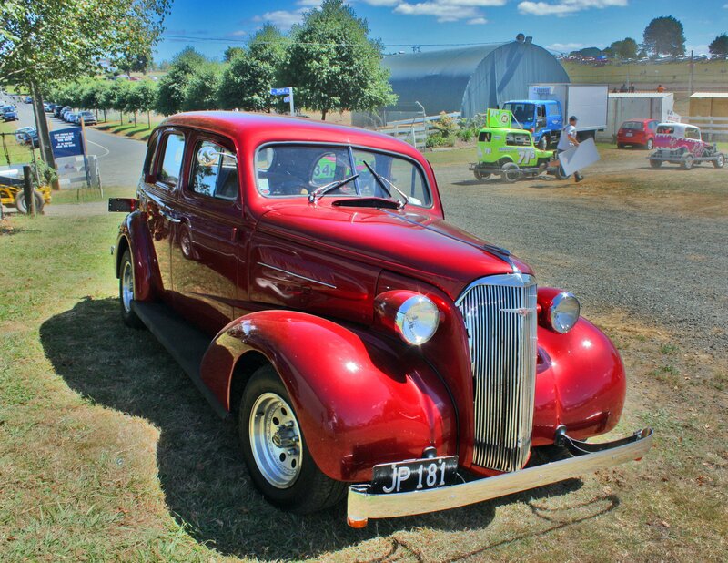 Red vintage car at a show