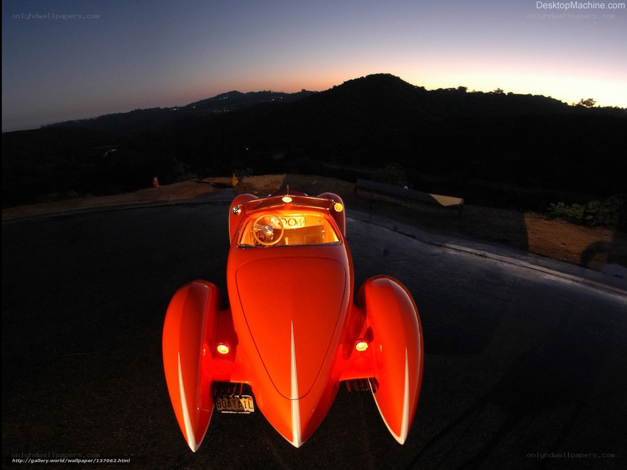 Red vintage car at dusk