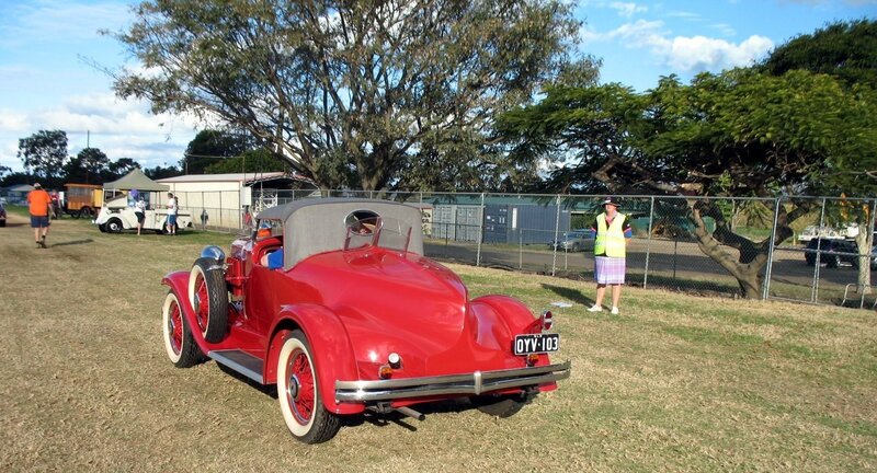 Red vintage car at outdoor show