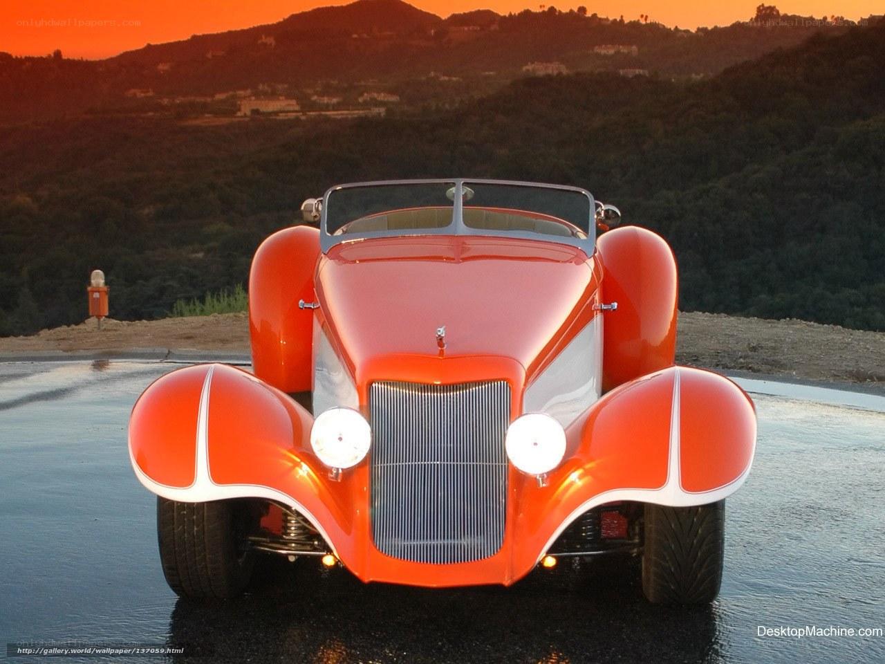 Red vintage car at sunset