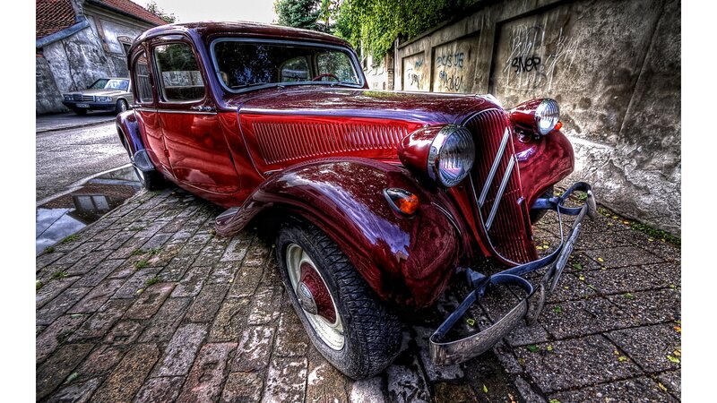 Red Vintage Car — Dramatic, Photograph, Cobblestone Street