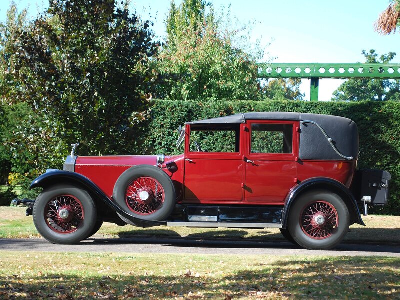 Red vintage car in garden